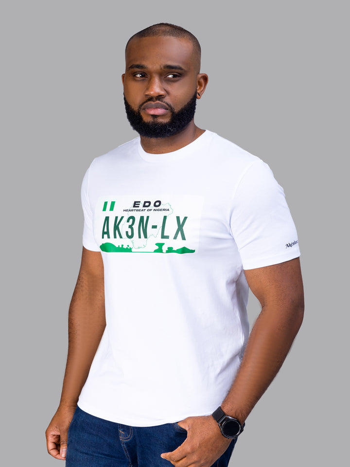 Male model wearing the AkénLuxe Number Plate T-Shirt, styled effortlessly for a modern, relaxed streetwear look.