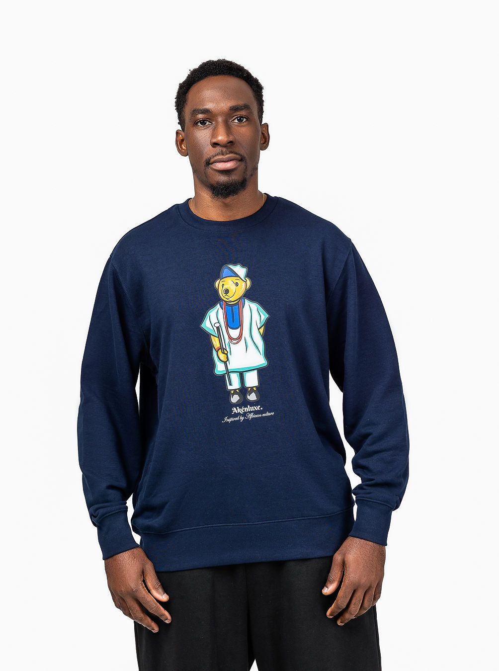 Close-up of Agbada bear graphic on navy sweatshirt AkénLuxe