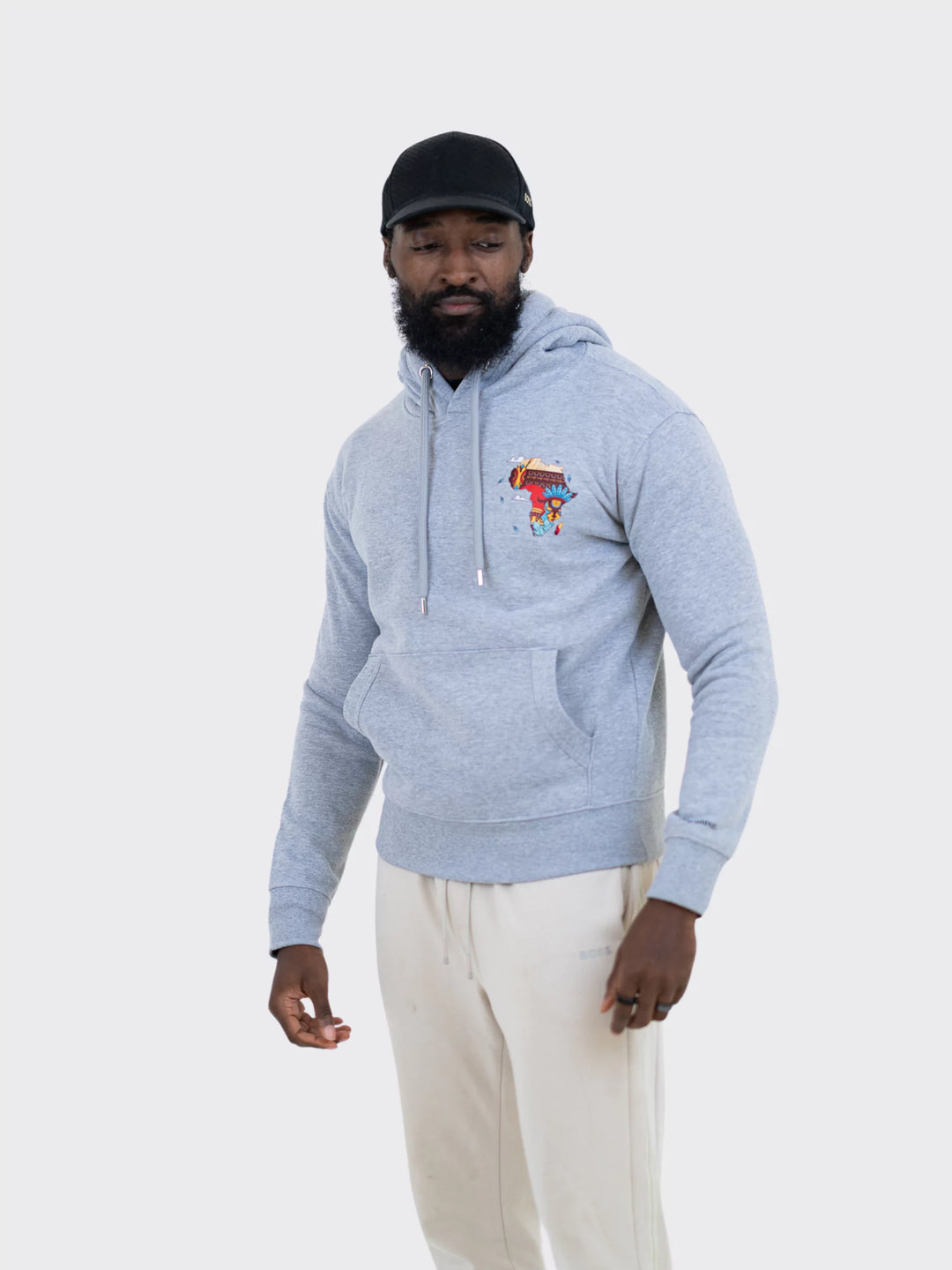 AkénLuxe Map Of Africa Vibrant Print Hoodie in black and Grey, featuring an oversized design with a small African map print on the left chest.