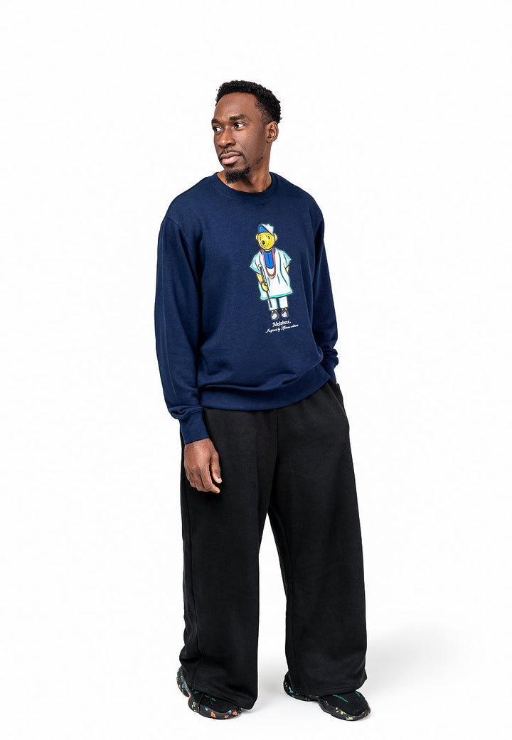 Model wearing navy AkénLuxe Agbada Sweatshirt streetwear fit